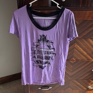 Disney parks Women’s Lavender Short Sleeve Graphic Tee with Black Trim